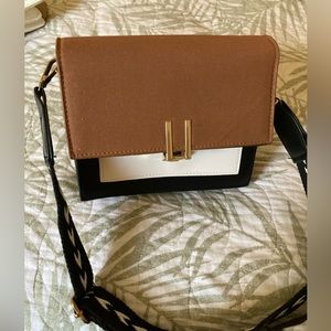 2 brand new small purses.